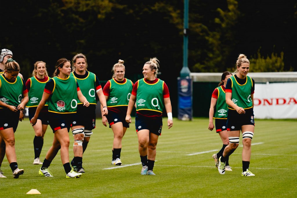 England captain Marlie Packer walks among her teammates in training